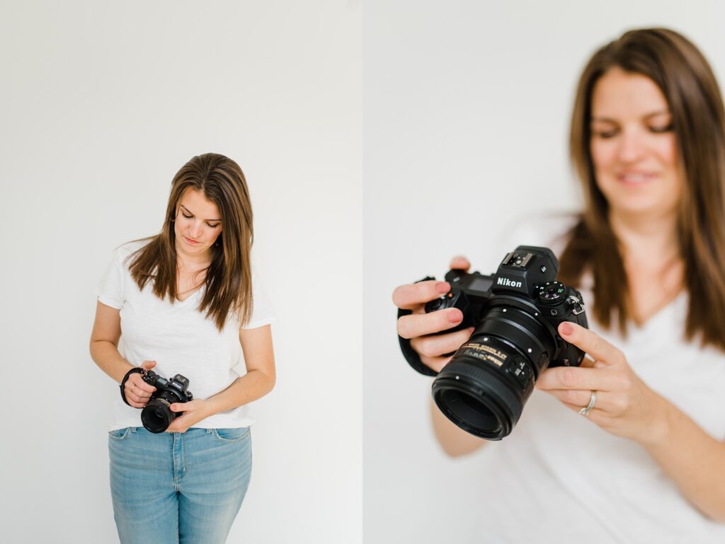 Female Photographer holding camera looking down at camera