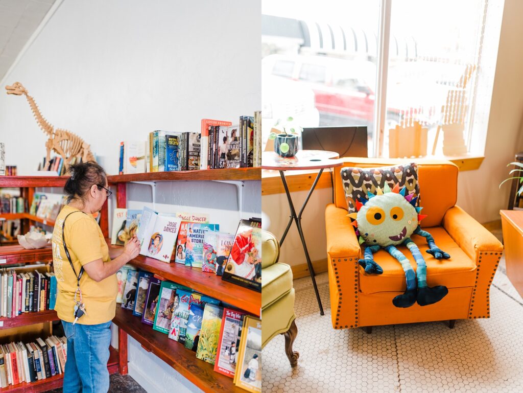 Indigenous woman shopping in the indigenous book section inside of Sundrop Books and an orange chair with a pillow shaped like a monster resting in the seat.