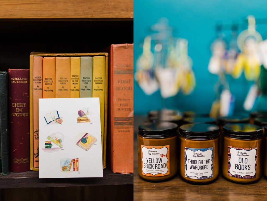 First photo: A watercolor print featuring books and a cute snail with those books.
Second photo: Book themed candles named "Yellow brick road" "Through the wardrobe" and "Old books"