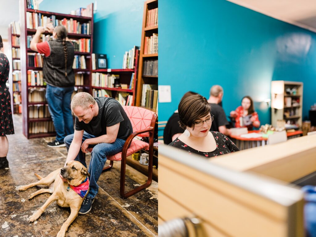 First Photo: Man petting Sundrop Books owners dog while he sits in a chair surrounded by bookshelves.
Second photo: Woman shopping the merchandise shelf inside of Sundrop Books.