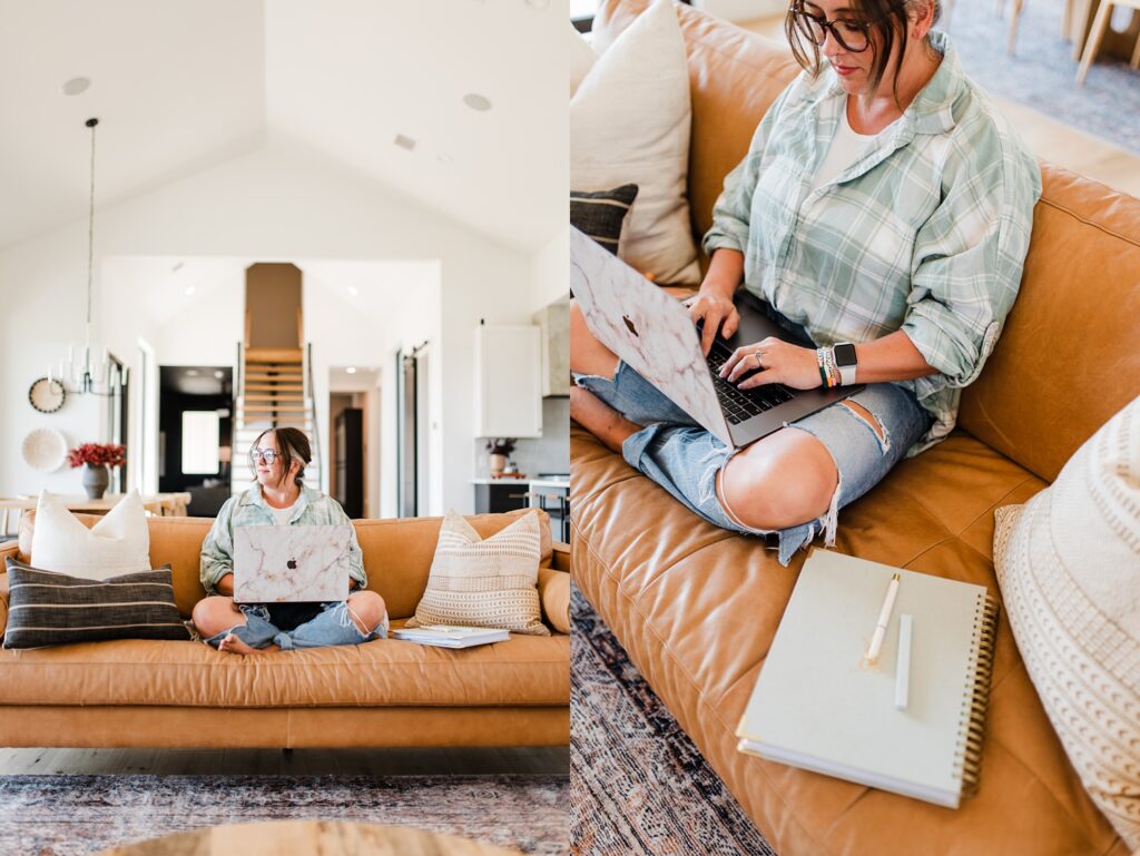Woman working on laptop on couch