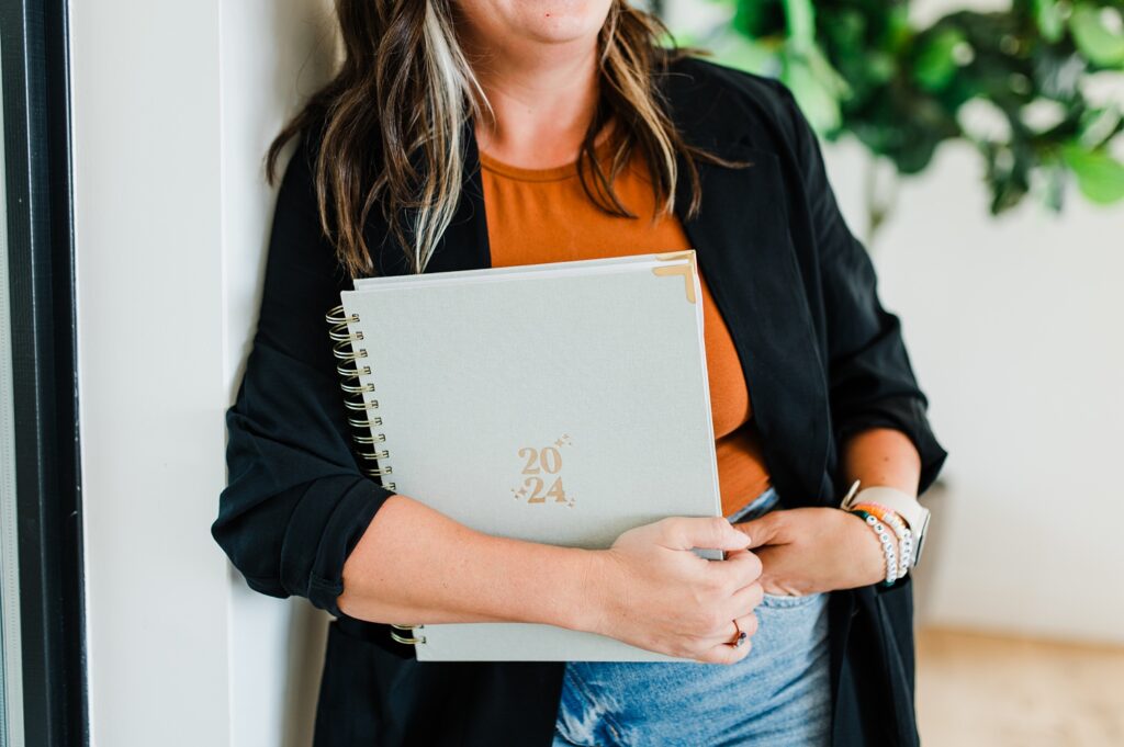 Woman holding planner