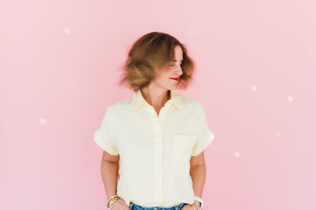 Brand photo of woman with a pink background