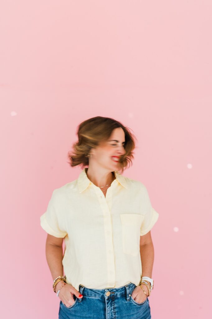 Brand photo of woman with a pink background