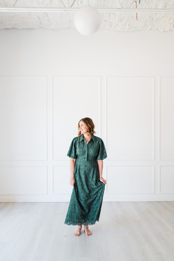 Brand photo of woman in green dress
