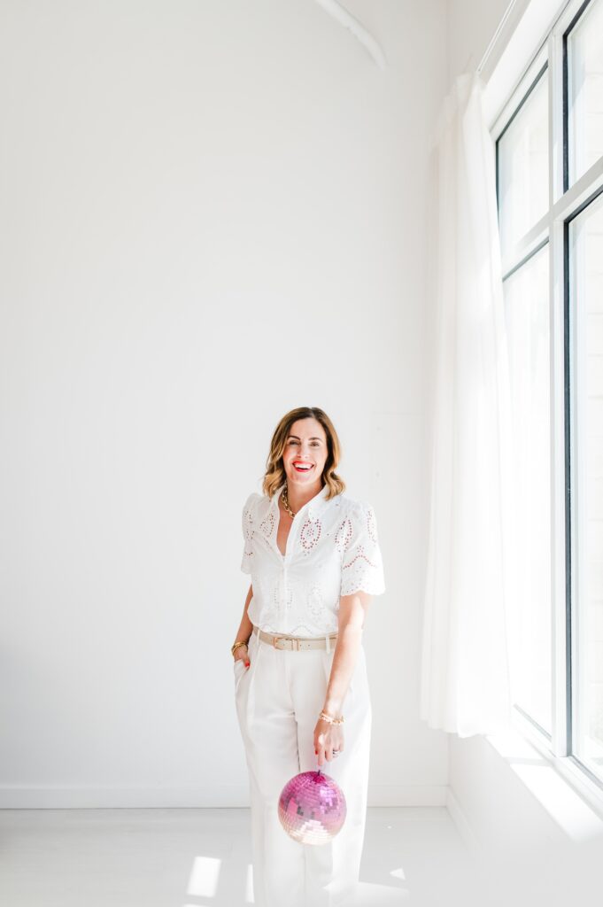 Brand photo of woman surrounded by white