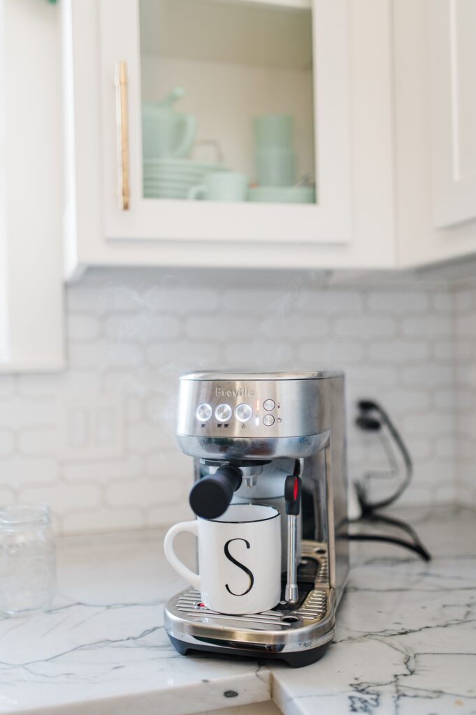 Brand photo of a woman making coffee