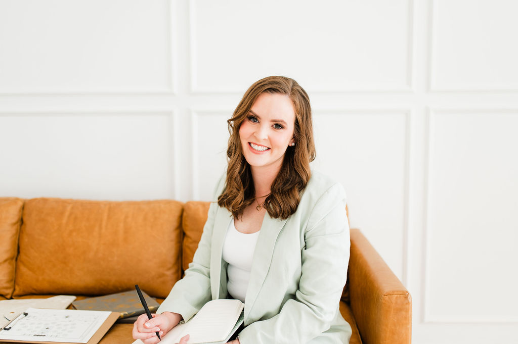 brand photo of a wedding planner looking at the camera and smiling