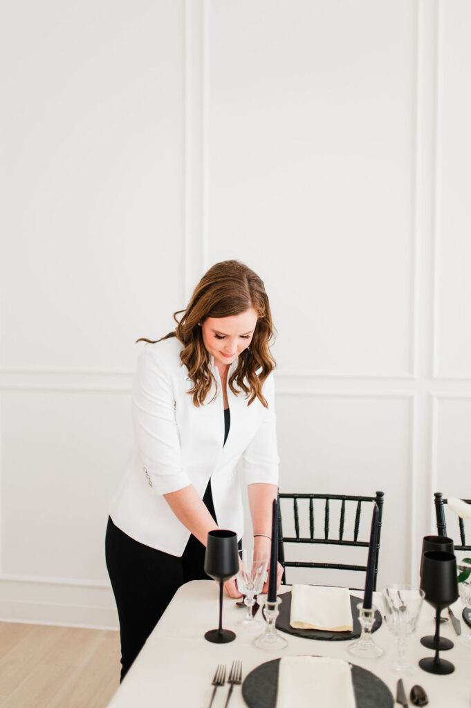 brand photo of a wedding planner setting table